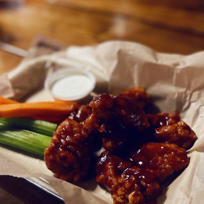 Deep fried boneless chicken wings topped with Honey BBQ