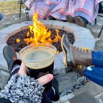 Craft Beer by the fire pit at Presidential Brewing's outdoor patio in Portage